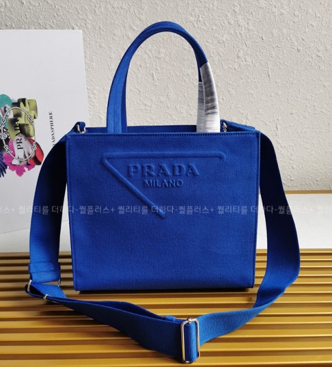 프라다 1BG382 삼각로고 드릴 토트 숄더백