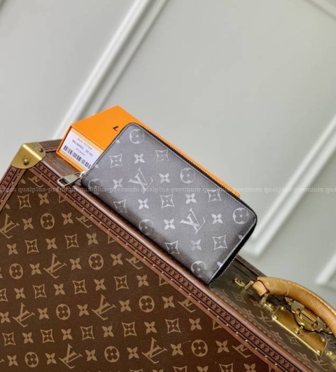 루이비통 M63095 지피 버티컬 월릿 장지갑 남성용